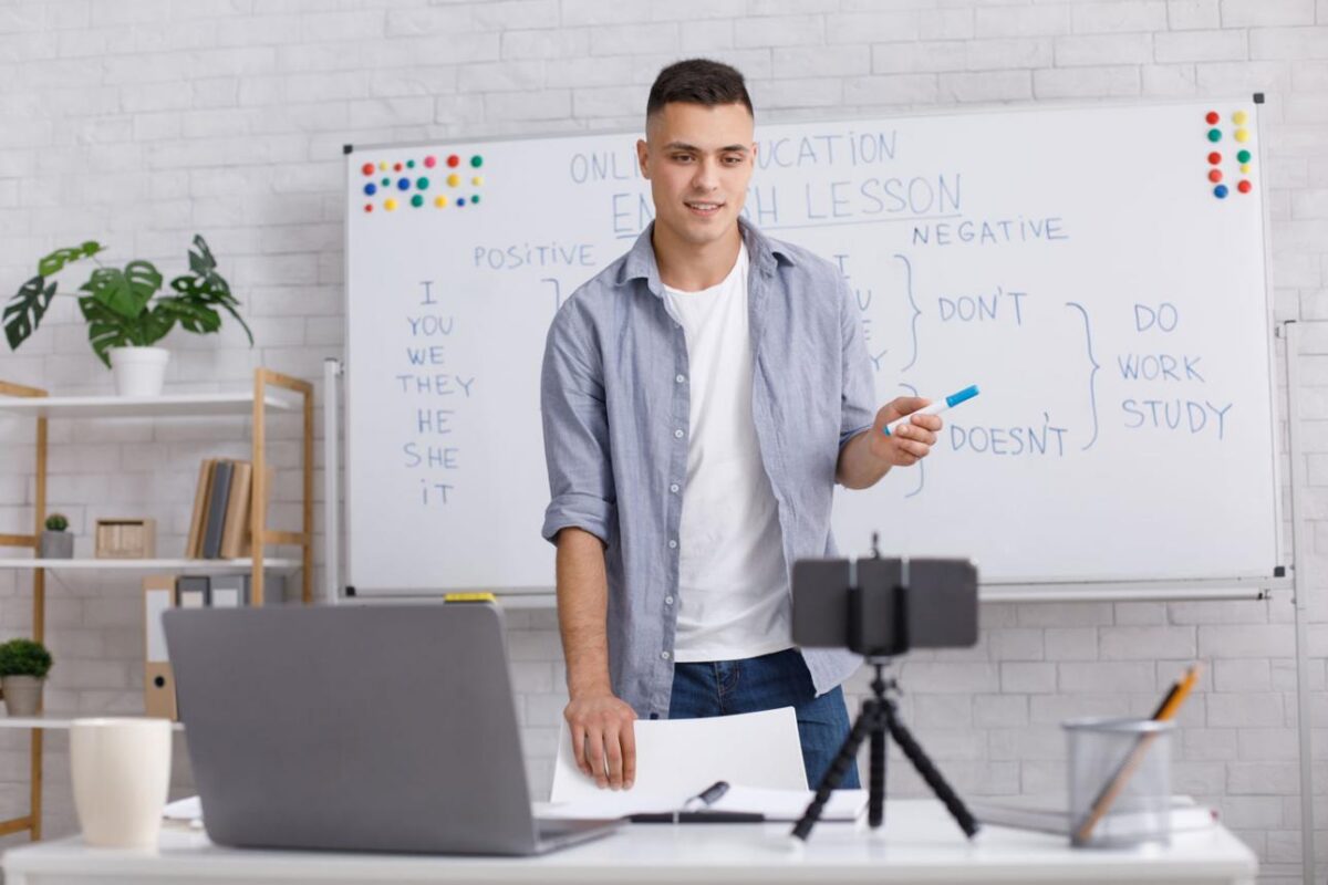adult teacher teaching in classroom