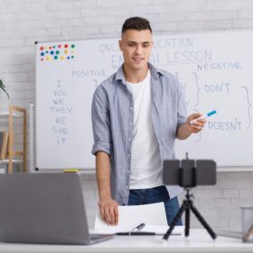 adult teacher teaching in classroom